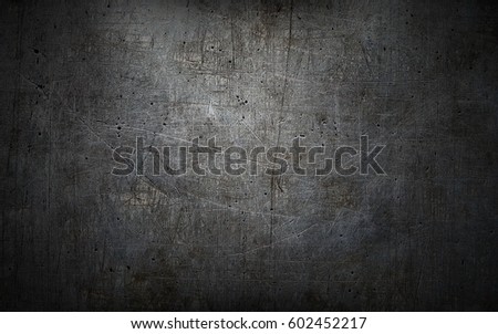 Grey grunge metal textured wall background Royalty-Free Stock Photo #602452217