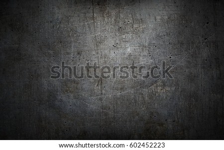 Grey grunge metal textured wall background Royalty-Free Stock Photo #602452223