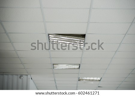 the construction of the ceiling, broken Ceiling light built-in white ceiling close-up diagonal view
