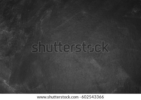 Chalk rubbed out on blackboard Royalty-Free Stock Photo #602543366