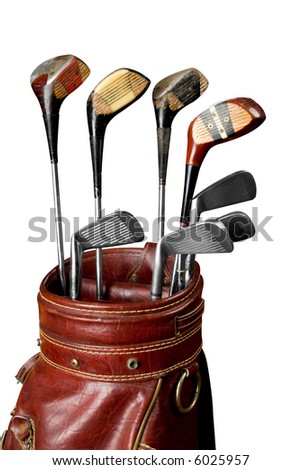 Vintage worn Golf clubs in an old bag isolated over a white background with a clipping path Royalty-Free Stock Photo #6025957