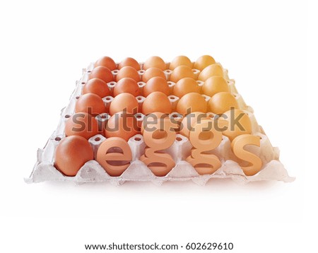 Chicken eggs in tray with 3d text render.
