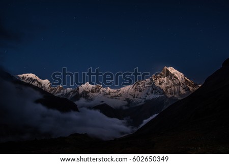Mt.Machapuchare in the reflection of sunset  with gain and soft focus