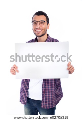 Young man holding white board - isolated 
