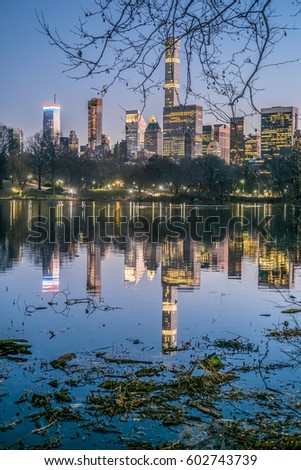 Midtown Skyline at night, view from the the lake in central Park, New York City