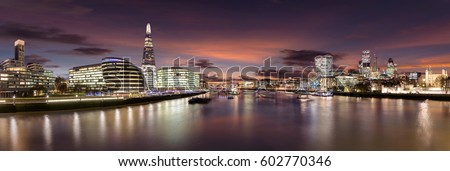 London skyline after sunset seen from Tower Bridge