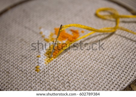 Cotton gray cloth canvas brown fingers with yellow thread and embroidered crosses