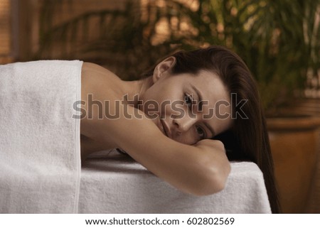 young woman on massage table