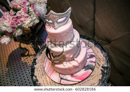 Designer pink cake with decorative elements