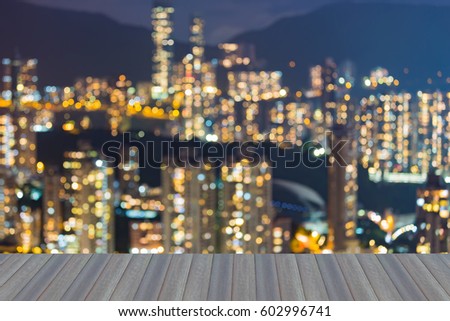 Blurred bokeh city apartment light night view, abstract background