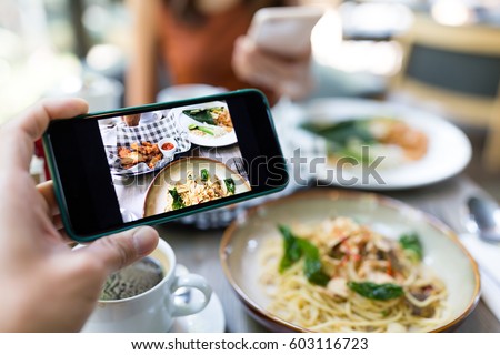 Taking photo on the food in restaurant