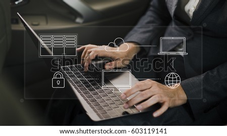 Hands working on a laptop cloud network graphic overlay