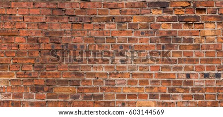 Old orange wall bricks as background panorama texture