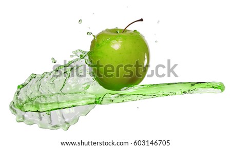 green apple in juice stream isolate on white