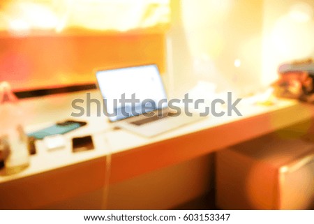 Picture blurred  for background abstract and can be illustration to article of notebook on table for work business
