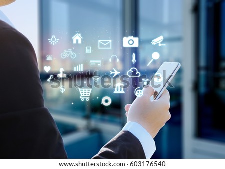 mobile apps concept.close up of Business man hands holding touch screen smartphone 