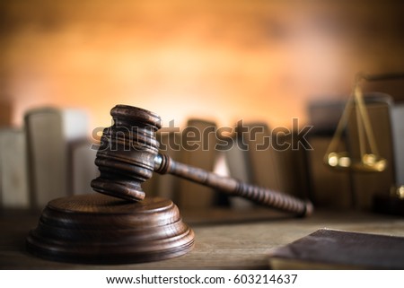 Law and Justice theme, mallet of the judge, justice scale, books, wooden desk, law concept. place for typography