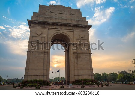 India Gate Delhi at sunrise with a vibrant moody sky. The India Gate, is a war memorial located on the east side of Rajpath road and a notable city landmark. Royalty-Free Stock Photo #603230618