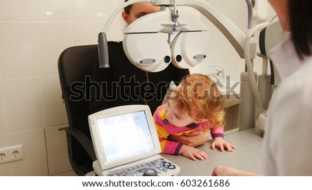 Child patient in ophthalmologist room - child with mommy at the on consultation