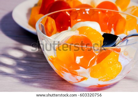 Mouthwatering Orange Jelly- Jello  Royalty-Free Stock Photo #603320756