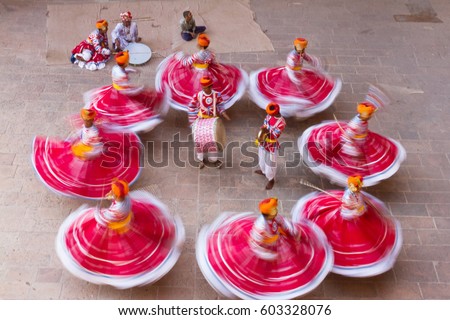 A group of performers were performing in traditional during a famous traditional Festival named Marwar Festival in India. Royalty-Free Stock Photo #603328076