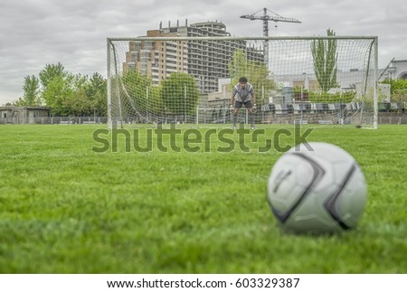 Soccer. Goalkeeper prepares to take a penalty.