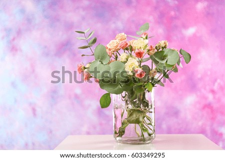 Beautiful flowers on pink background