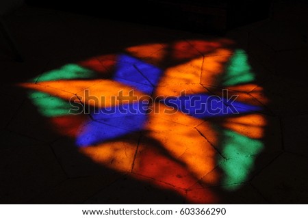 Stained glass shadow on the floor, colorful, horizontal