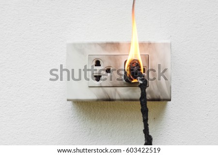 Electricity short circuit / Electrical failure resulting in electricity wire burnt Royalty-Free Stock Photo #603422519