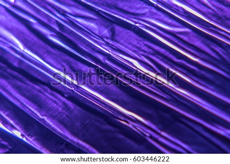 Ripples of Light.  Textured background in lavender with veins of light and shadow.  Useful for a presentation background or graphic backdrop.