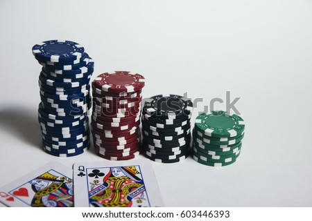 playing cards,dices and poker chips from above on white table, isolate