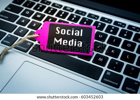 Chalkboard on keyboard with text SOCIAL MEDIA, Information, communication and technology concept