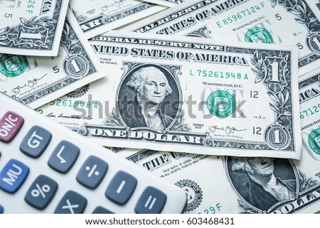 Calculator with american dollars, United states money, finance concept