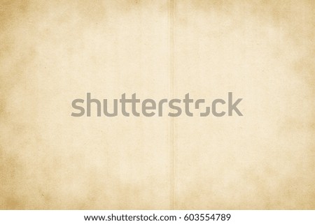 Paper texture light rough textured spotted blank copy space background in beige yellow,brown