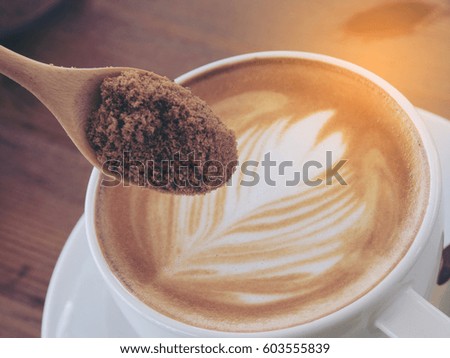 Adding brown sugar to latte art coffee 