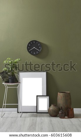 natural green wall interior concept behind empty frame with mock up 