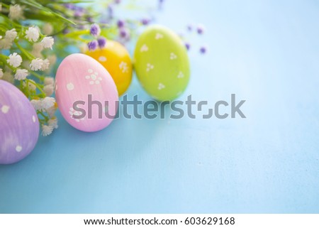 Easter eggs decoration on a wooden table.
