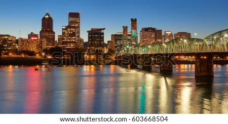Portland Oregon downtown skyline autumn twilight panoramic view with Hawthorne Bridge.