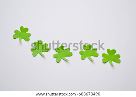 Leaf clover green paper luck nature icon on white background. Green foliage plant shamrock irish patrick day symbol.
