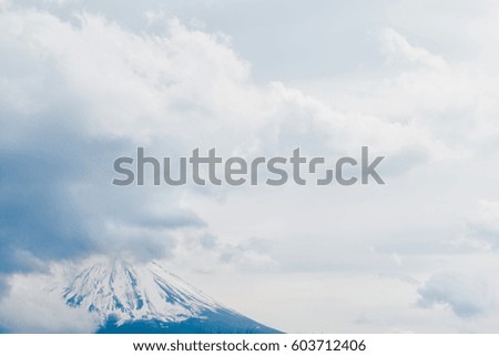 This is a picture of Mt. Fuji. , The highest mountain in Japan , top of mountain fuji and snow with cloud sky in summer season