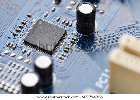 Components on board. PCB to PC. Chip, capacitor and connectors on the motherboard of a personal computer. Modern technological background.