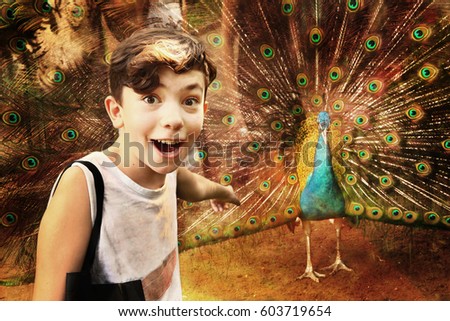 Teen boy in  zoo admire peacock tail open
