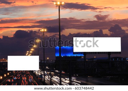 Blank billboard ready for new advertisement on dramatic sunset sky with clouds background