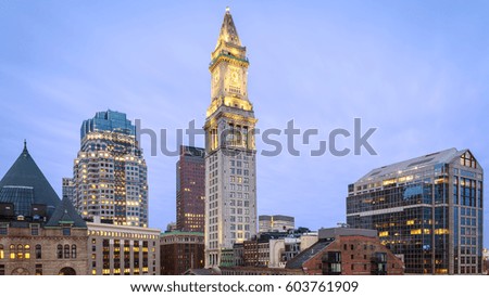 The architecture of Boston in Massachusetts, USA at night with its mix of modern and historic architecture.
