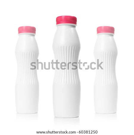 Picture of three blank plastic bottles over white. Depth of field effect