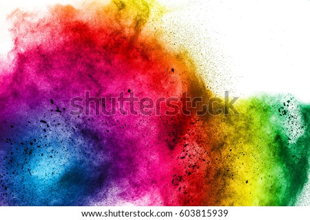 Freeze motion of colorful  painted powder exploding  on white background. Abstract design of color dust cloud. Particles explosion. Splash of colorful painted powder on white background.