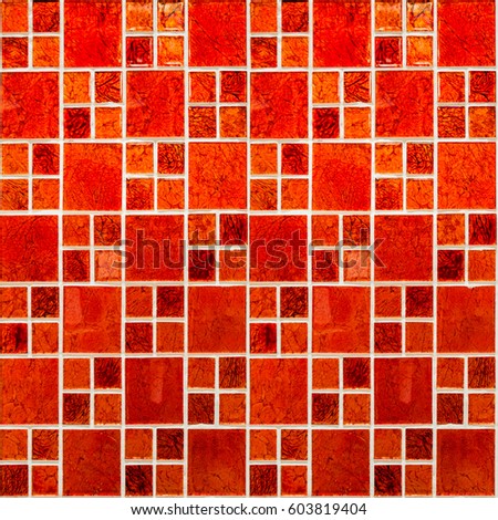 Red mosaic wall texture and background