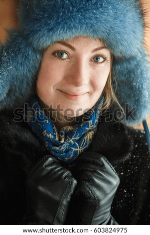 Girl in the winter in the park