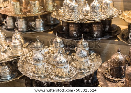 Traditional handmade tea and coffee sets or teapots for sale at the Egyptian Bazaar and the Grand Bazaar in Istanbul, Turkey