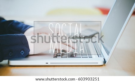 Social Media, text over young business man typing on laptop at desk in office environment